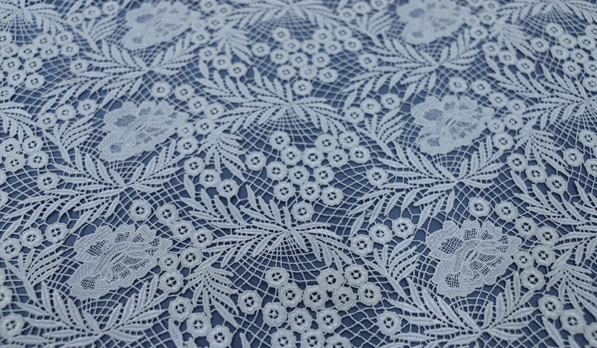 Leavers lace is made by weaving thousands of individual threads