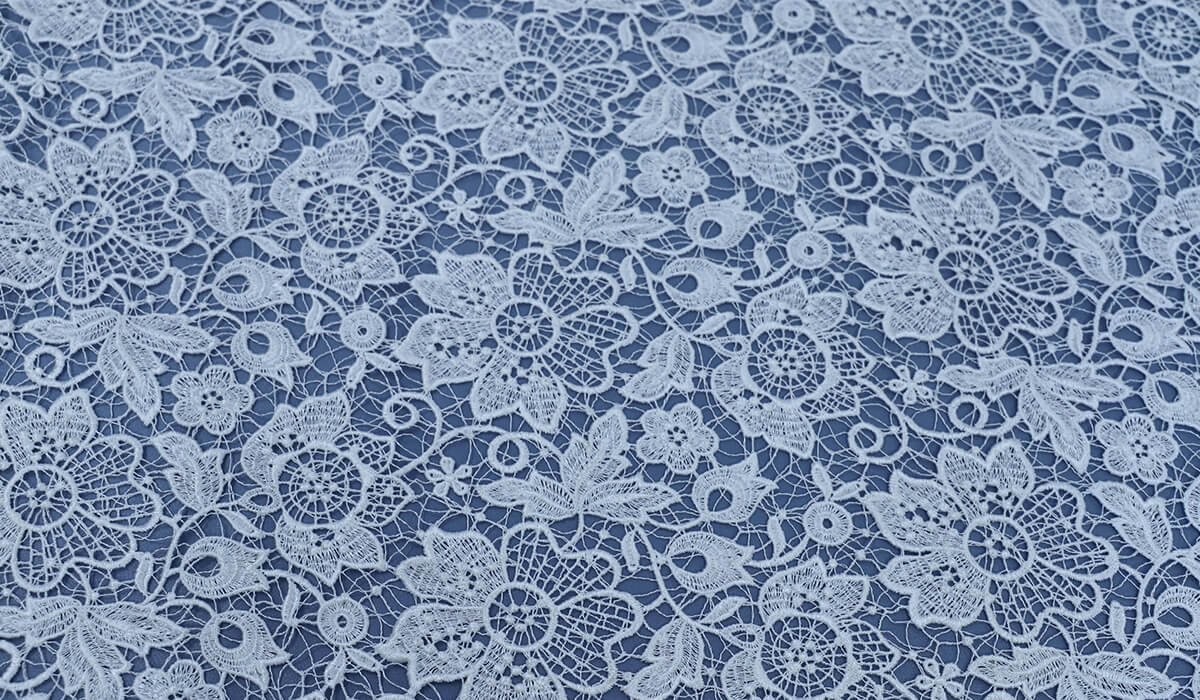 Tessuto in pizzo per matrimoni estivi: I 3 migliori materiali in pizzo per un look da matrimonio elegante